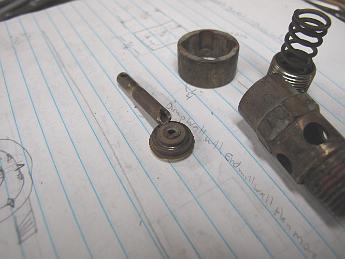  Here is the disassembled valve. The stem broke where it meets the valve disk.